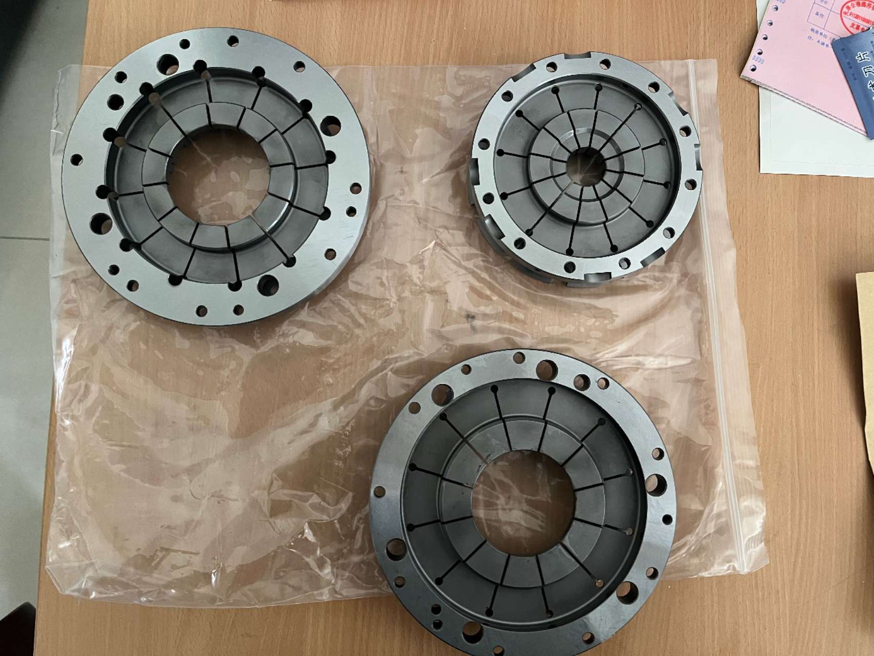 Rear view of the diaphragm collets showing radial slots, centre bores and mounting holes